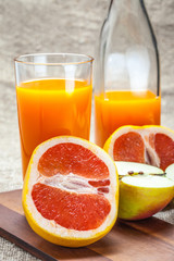 Juice of apples and red grapefruit.