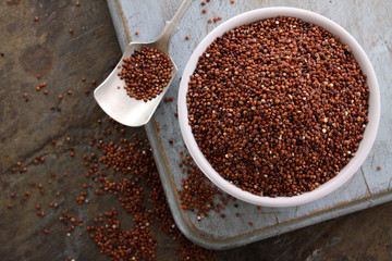 healthy uncooked red quinoa in dish