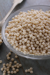 healthy uncooked giant couscous in dish