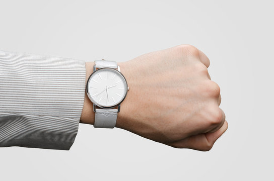 stylish white wristwatches on the hand businessman