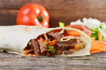 Closeup of tasty kebab with beef and vegetables
