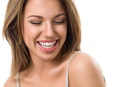 Young candid woman laughing