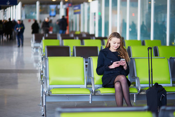 Young female traveler in international airport