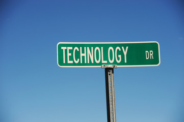 road sign with technology drive