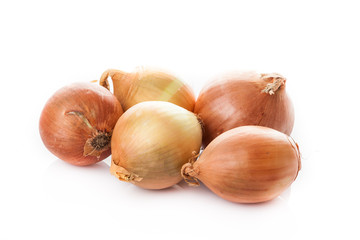 onion bulbs isolated on white background. Fresh golden onions