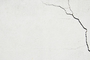Crack at a corner of a white wall