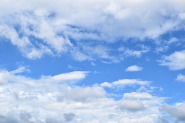 Obraz premium white fluffy clouds in the blue sky