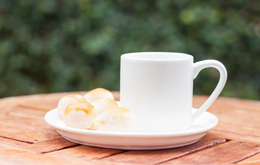 Mini Chinese cakes on wooden plate