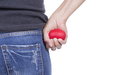 Hands of a woman squeezing a stress ball