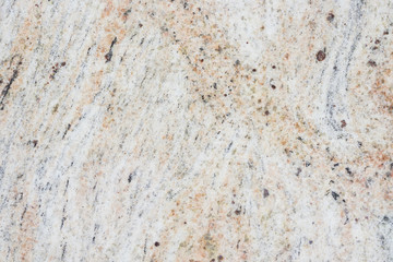 Beige granite background, texture with natural pattern.