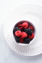 raspberries and black berries. fresh berries