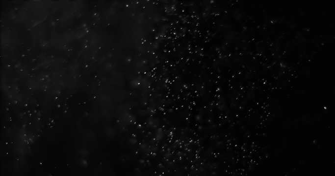 abstract dust particles on dark background loop seamless ready, light spot movement