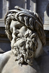 River Ganges statue as greek god from Fountain of Four Rivers at the center of Navona Square, in Rome © crisfotolux