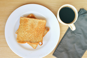 Delicious breakfast with toast and coffee.