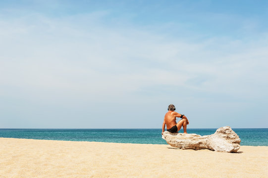 Blue sea with some people relaxation