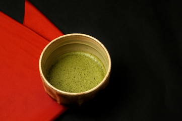 抹茶と朱色の布.