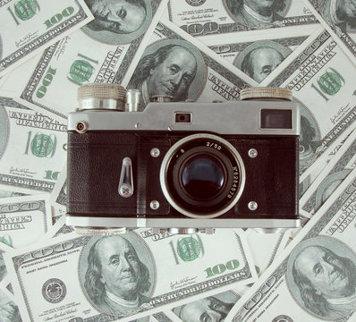 Background with money american hundred dollar and old photo came