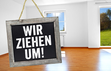 Tafel, Kreidetafel mit Wir ziehen um