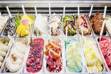 italian gelato gelatto ice cream display in shop - 104705706