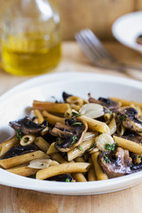 Penne with mushroom and herb sauce