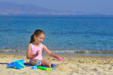 Real toddler girl enjoying her summer vacation