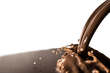 splash of chocolate, pouring stream jet of chocolate, cocoa, isolated on white background
