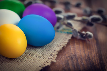 Easter decoration , colorful Easter eggs on wooden background