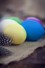 Easter decoration , colorful Easter eggs on wooden background