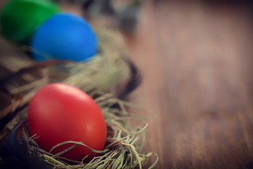 Easter decoration , colorful Easter eggs on wooden background
