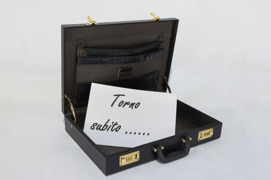 24 hours black briefcase with a ticket
