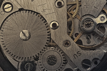 Fototapeta na wymiar The clock mechanism of old watches