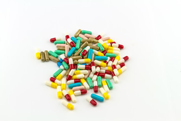 Fototapeta na wymiar Colorful tablets medicine isolate on white background