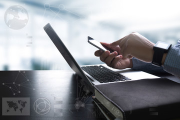 Obraz premium designer work and smart phone and laptop on wooden desk in offi