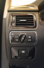 Modern car headlight controls.
