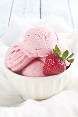 Strawberry ice cream and strawberries.