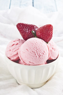 Strawberry ice cream and strawberries.