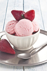 Strawberry ice cream and strawberries.