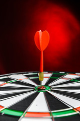 Fototapeta premium Darts arrows in the target center