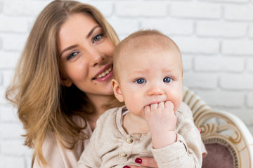 Happy mother with baby child
