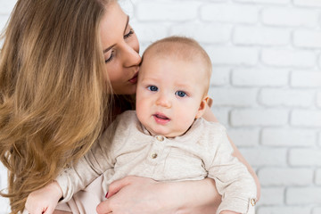 Happy mother with baby child