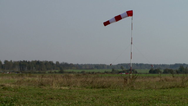 View of windsock at airfield in summer