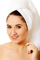 Portrait of young  smile woman with towel