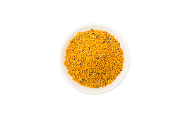 Bee pollen in white bowl over white background