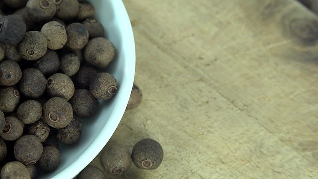 Portion of rotating Allspice (seamless loopable 4K footage)
