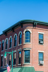 Fototapeta premium Window Air Conditioner on Old American Brick