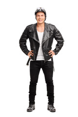 Young cheerful biker in a black leather jacket