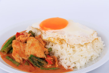 Fried pork curry, Stir fried pork and red curry paste with sunny side up egg (Moo Pad Prik Gaeng). Thai food.