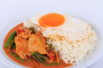 Fried pork curry, Stir fried pork and red curry paste with sunny side up egg (Moo Pad Prik Gaeng). Thai food.