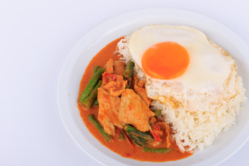 Fried pork curry, Stir fried pork and red curry paste with sunny side up egg (Moo Pad Prik Gaeng). Thai food.
