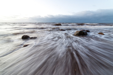 Fototapeta na wymiar Storm large wave on the shore of the Baltic sea
